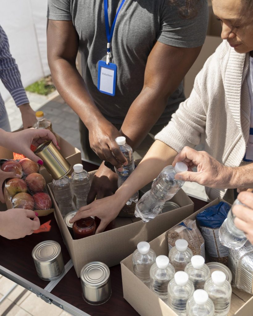 group-different-people-volunteering-foodbank-poor-people